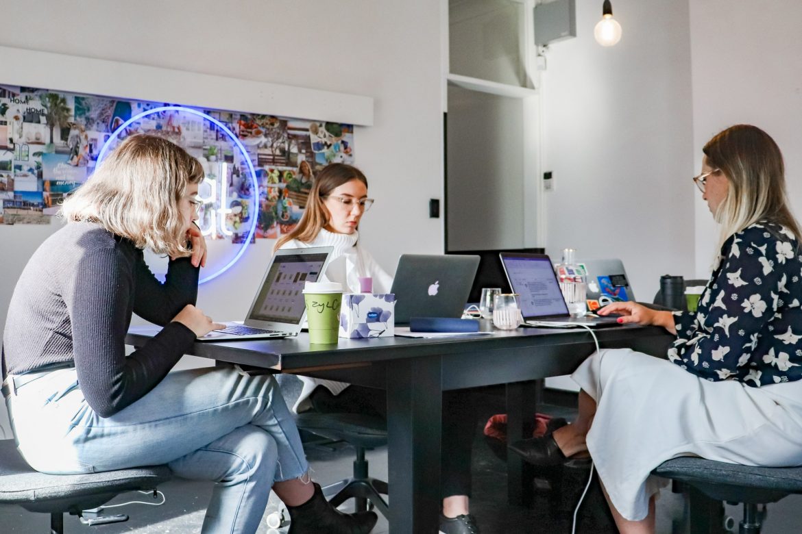 Three women working in an office